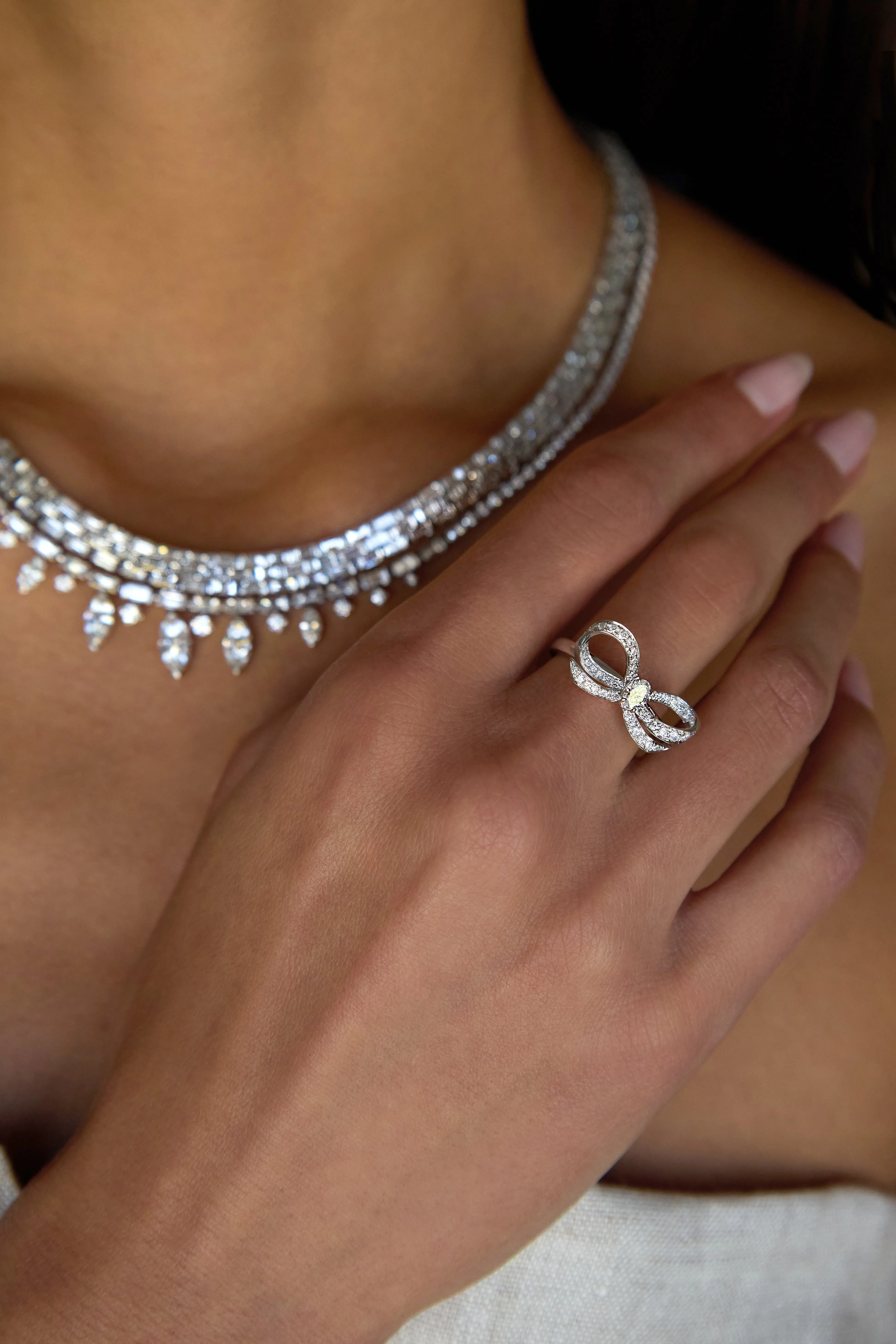 DIAMOND BOW RING WITH OVAL DIAMOND CENTER Anita Ko