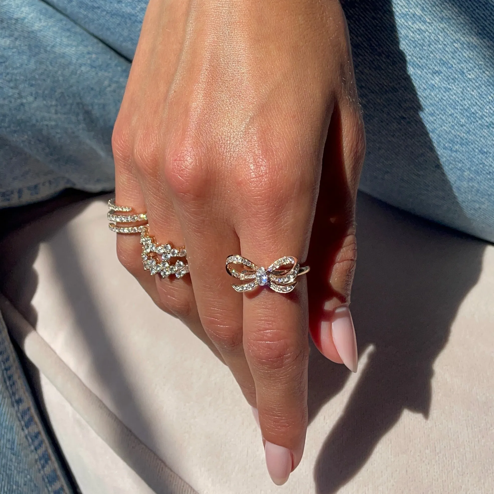 DIAMOND BOW RING WITH OVAL DIAMOND CENTER Anita Ko